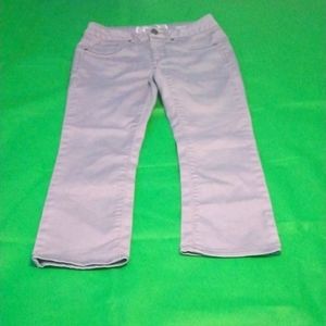 I'm selling grey jeans that are cropped and short